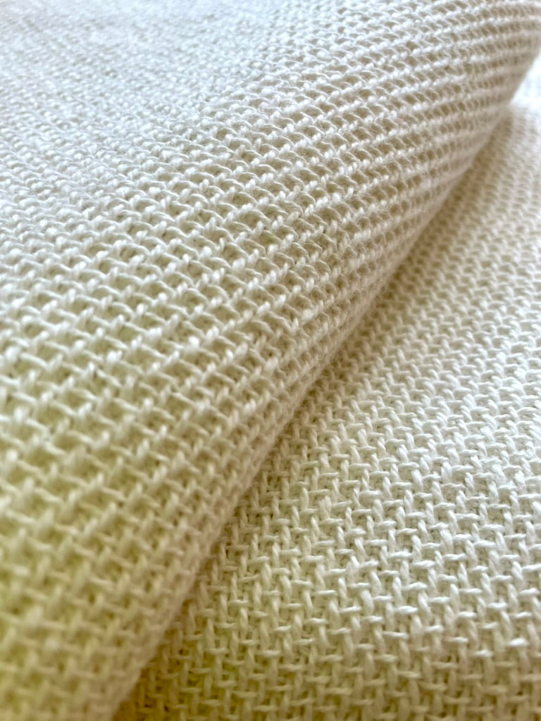 pine cone hill dove white twin blanket made of 100 percent cotton cream color with visible weave texture and fringe edge 50 by 70 inches from annie selke