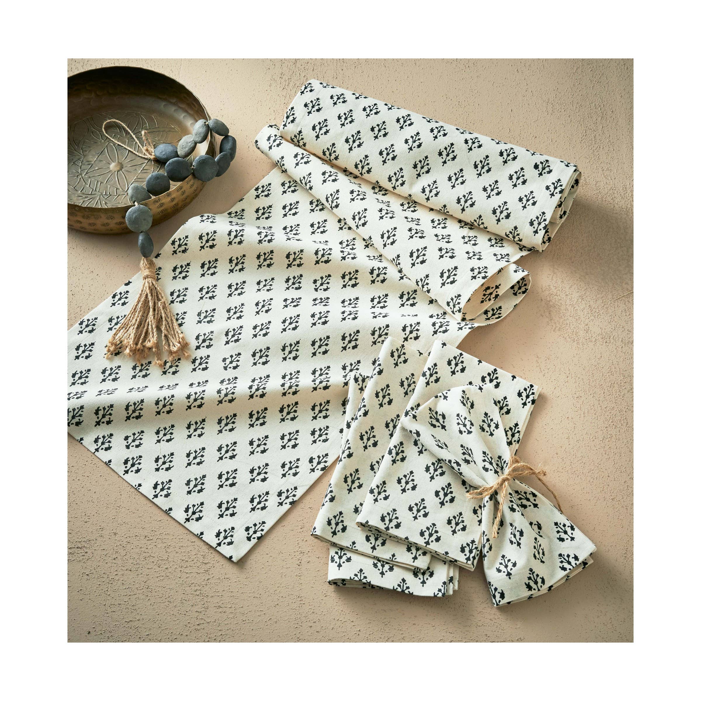 Black and cream cotton napkin with hand block printed design, 20-inch square