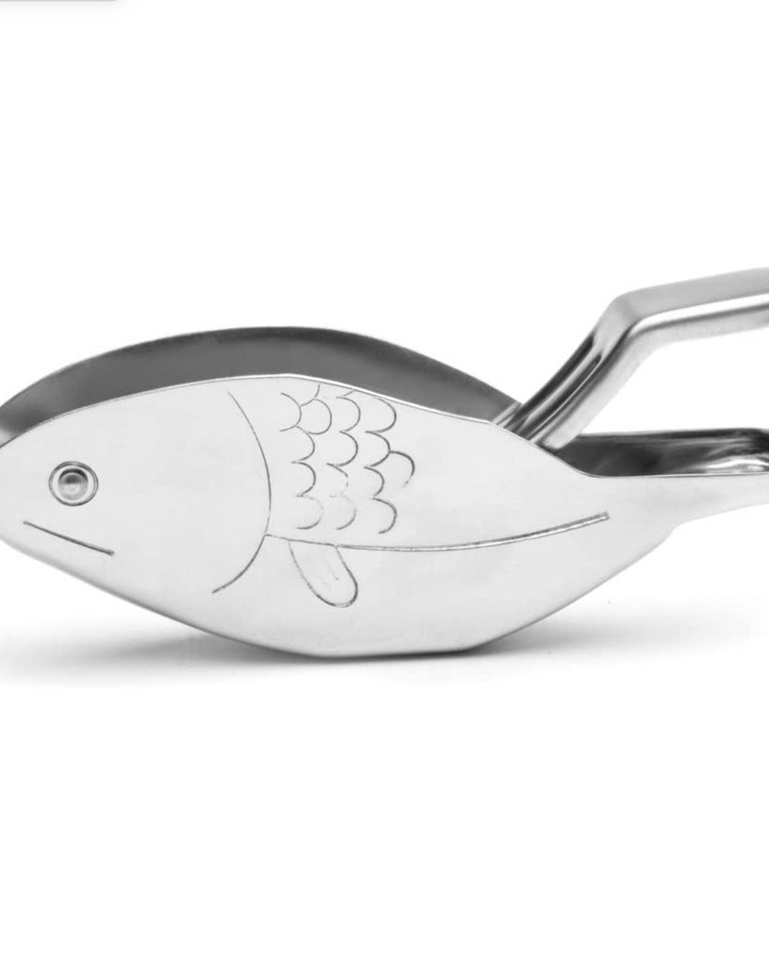 Stainless steel lemon squeezer in the shape of a fish with etched scale details