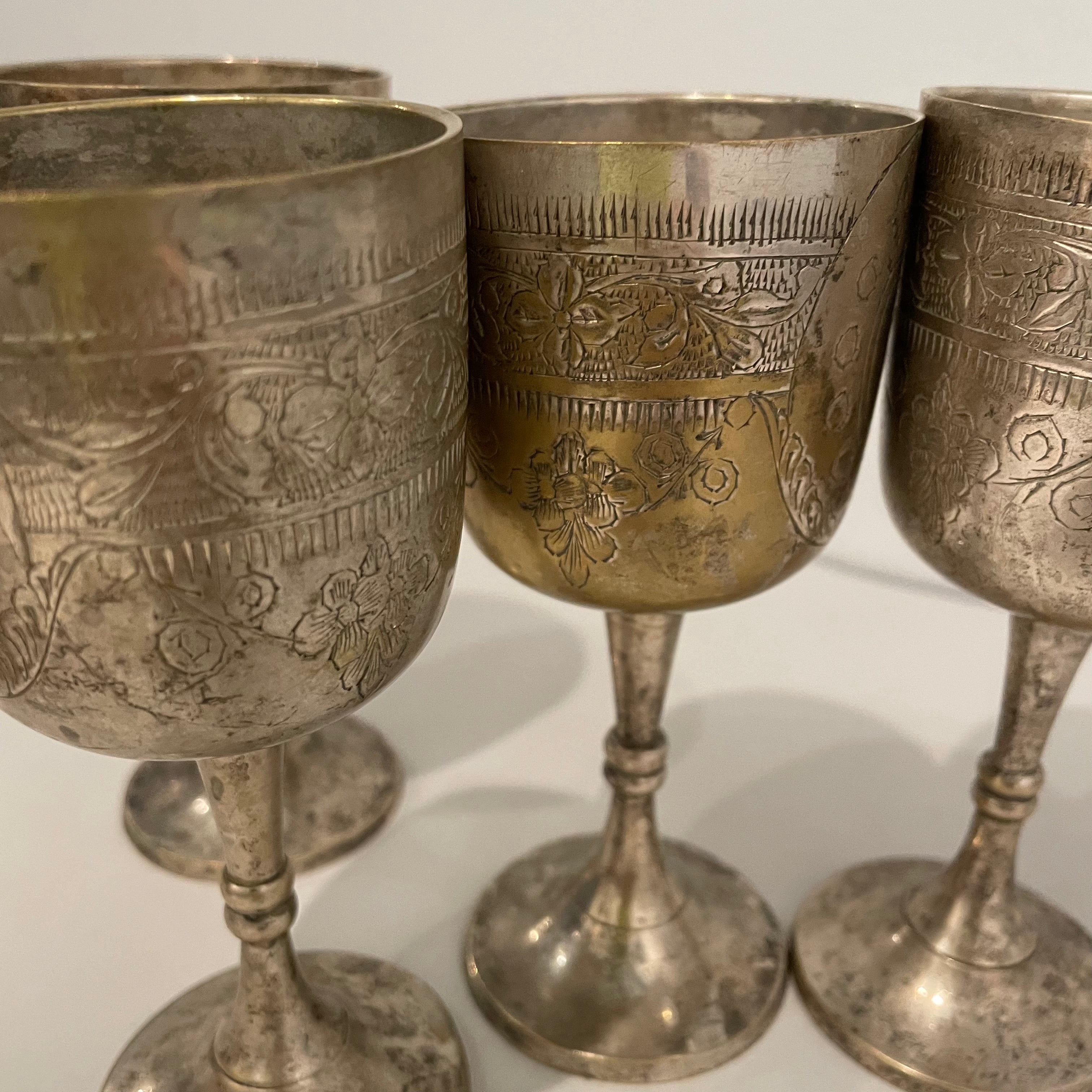 Set of vintage silver-plated aperitif glasses with floral engravings and aged patina, 5 inches tall