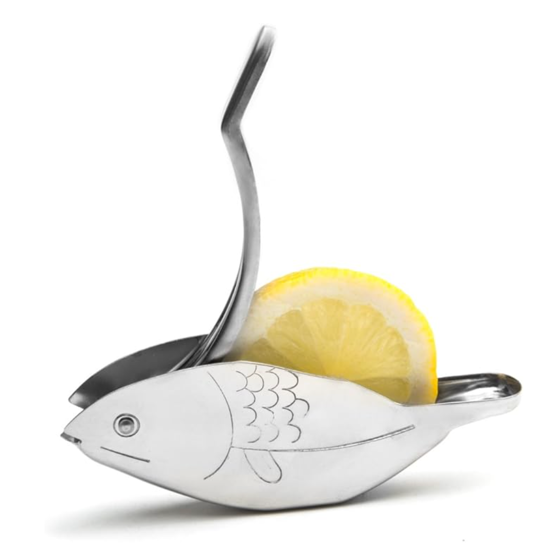 Stainless steel lemon squeezer in the shape of a fish with etched scale details