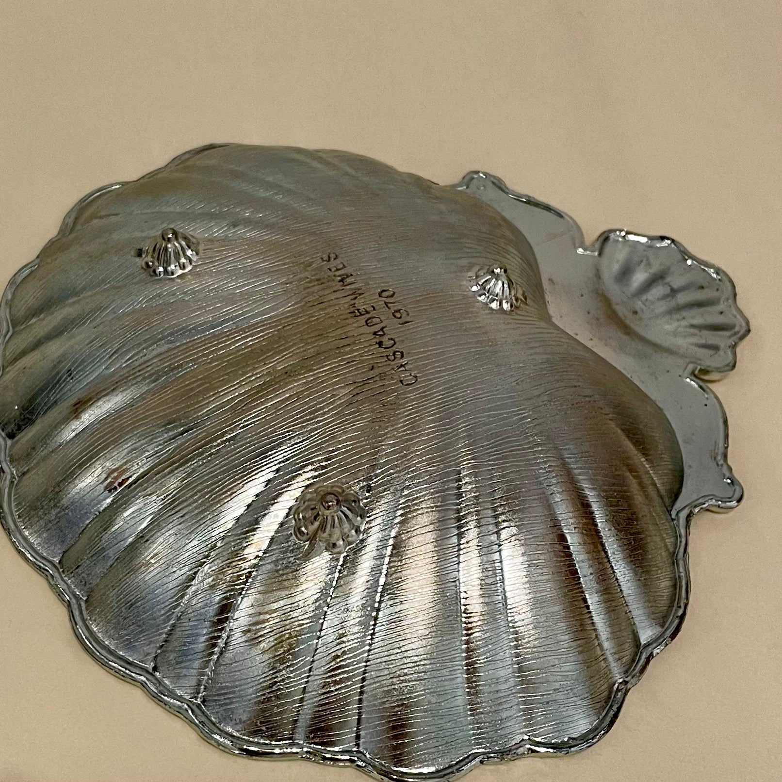 Vintage silver shell tray with starburst design Cascade Wives 1970 decorative catchall dish minor age-related wear 6 inch height 5.5 inch length 1 inch width