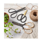 Iron garden shears with tan woven cane-wrapped handles, 38 inches tall